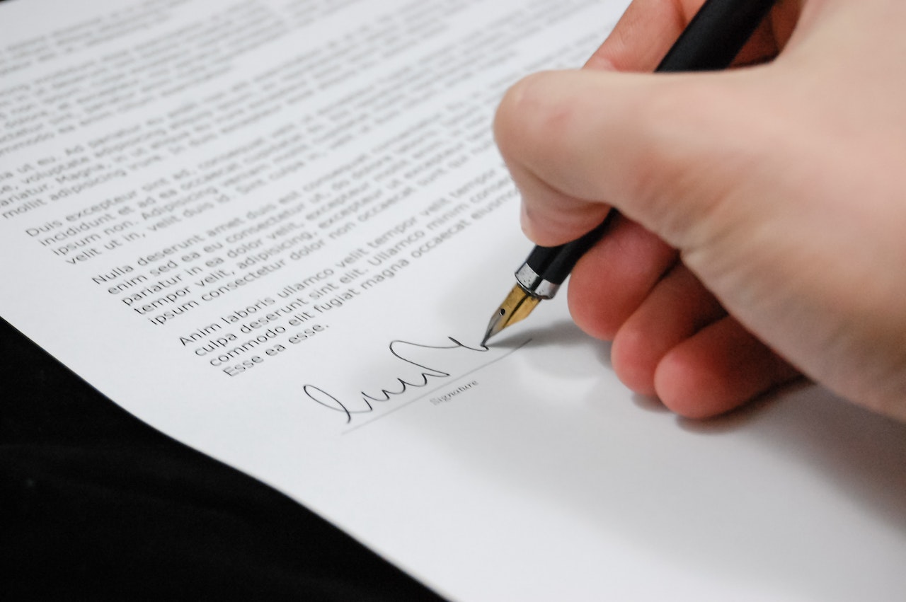 Person signing document. Benefits and limitations of prenups in Australia.